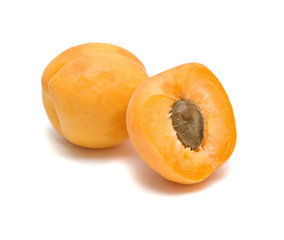 Apricot and its section isolated on white background
