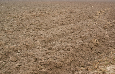 Brown soil, agricultural field background