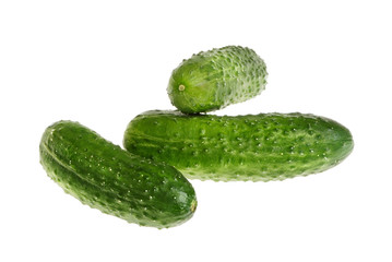 Three green cucumbers