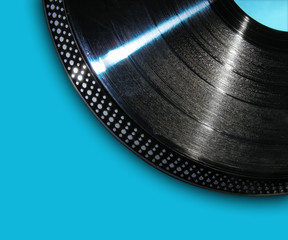 Record Playing on Blue Background