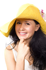 Young lady in yellow hat isolated on white
