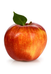Red apple with green leaf