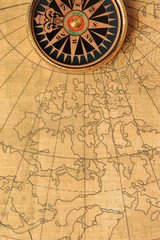 Fototapeta na wymiar Old compass and map