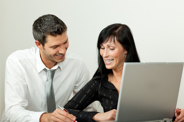 Portrait of working businessteam smiling and friendly