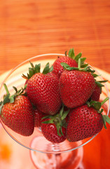 Fresh strawberries in a glass