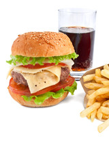 cheeseburger, french fries and cola on white background