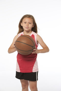 Little Girl Holding Basketball