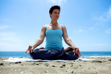 Fototapeta na wymiar Yoga on the Beach