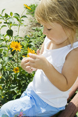 Girl holds flower