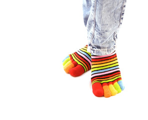 woman legs in strip sock on white background