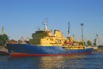 Fototapeta premium Icebreaker type industrial ship in the harbor