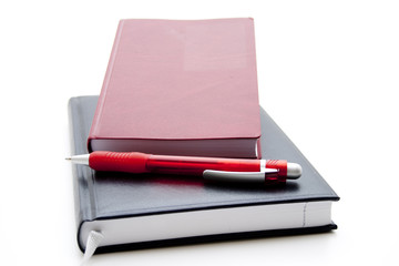 Kalender und Kugelschreiber