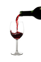 Red wine pouring into a wine glass - 14689098