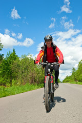 Obraz premium Travelling cyclist