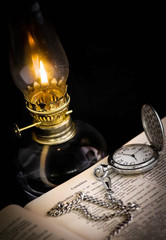 pocket watch and lamp