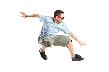 Fototapeta premium An attractive young man jumping in the air