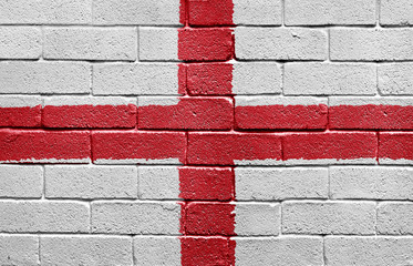 Fototapeta na wymiar Flag of England on a brick wall