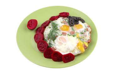 fried eggs and red eggplant