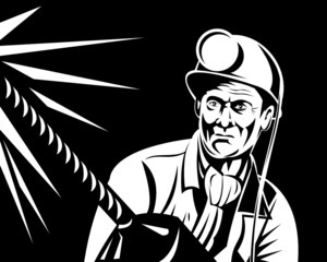 Coal miner with rock drill