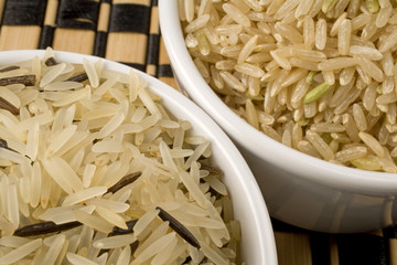 Wholegrain, wild and Basmati rice in bowls