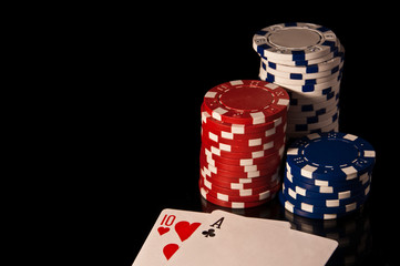 Casino Chips red and black and white and cards