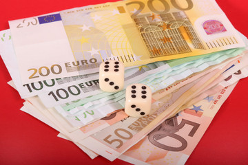 money and dice cubes
