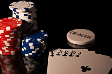 Casino Chips red and black and white and cards