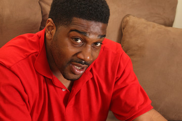 Obraz premium Male on couch close-up