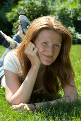 girl lying on a grass