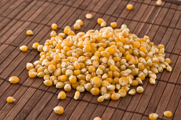 Corn kernels on bamboo mat