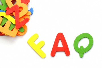 Plastic Toy Letters "FAQ" Isolated on White