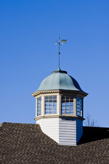 Cupola and Weather Vane on Blue
