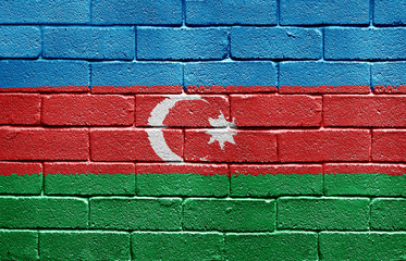 Flag of Azerbaijan on brick wall