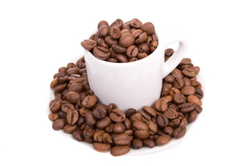 Cup of coffee, full of beans