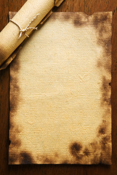 Old blank paper on wooden table