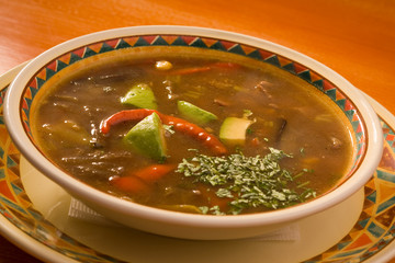 Soup with meat and avocado