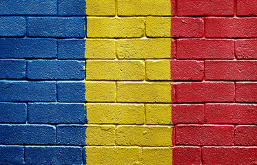 Flag of Romania on brick wall