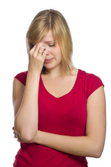 blonde female having a headache