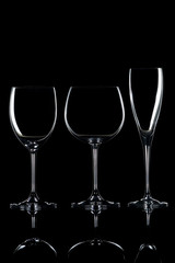 three glasses isolated on black background