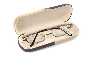 Glasses in spectacle case on white background