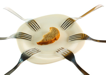 Six forks and a crust of a bread