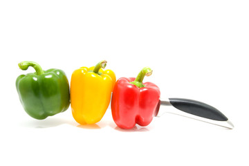 Paprika spear on knife isolated on white background