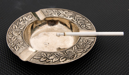 cigarette and ashtray