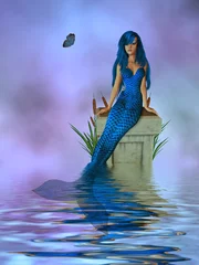 Fotobehang Zeemeermin Blauwe zeemeermin zittend op een voetstuk in de oceaan