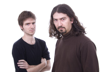 Fototapeta na wymiar Two casual men posing, isolated over white background