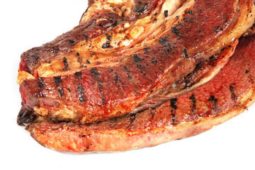 steak close up on white dish