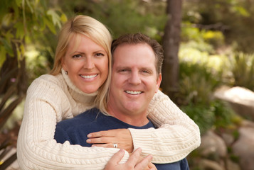 Naklejka premium Happy Attractive Couple in the Park