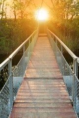 Fototapeta na wymiar small bridge on a sunset