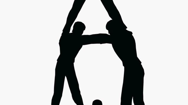 businessman on the top of pyramid silhouette