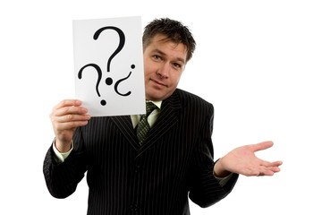 Businessman is holding question marks
